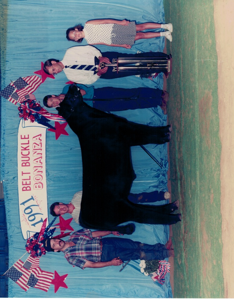 People near the bull